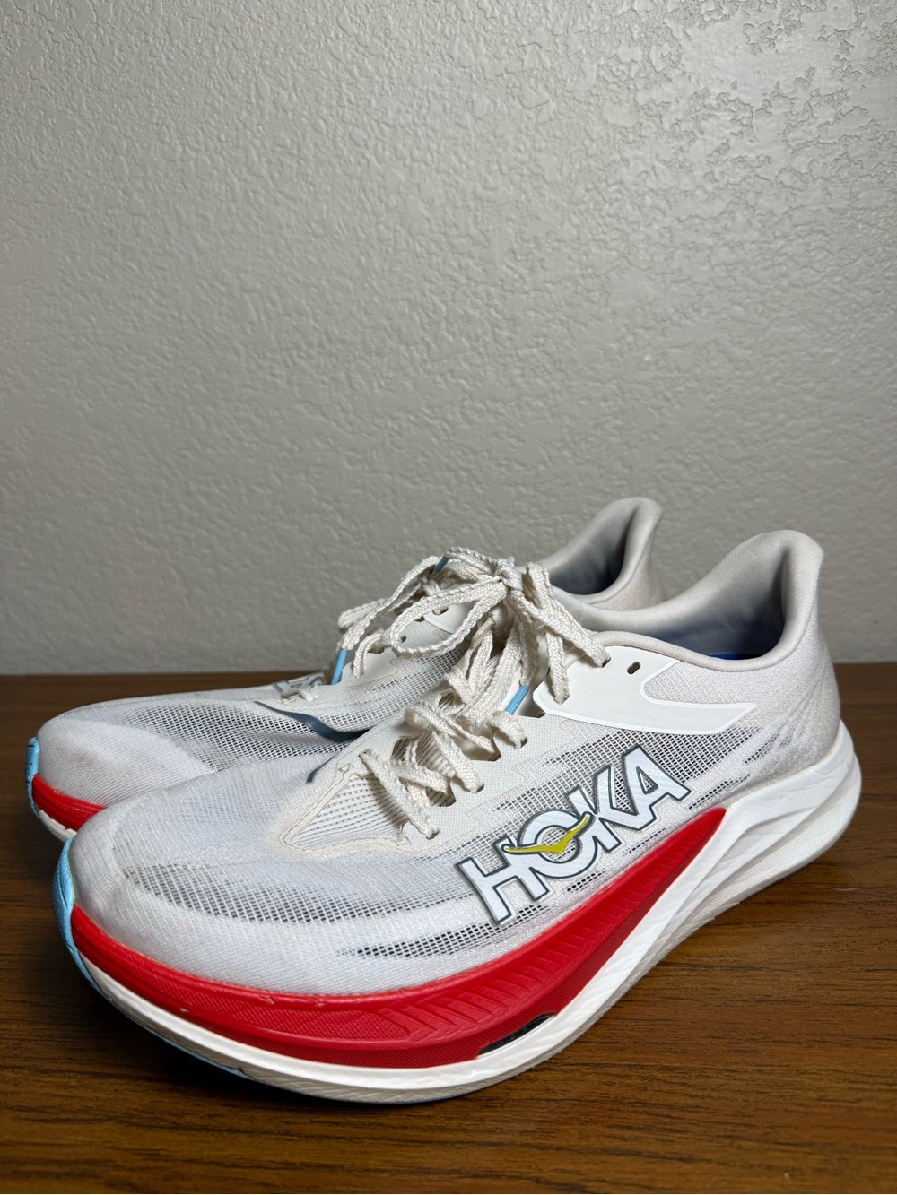Hoka Men's White Running Shoes with Red & Light Blue Accents
